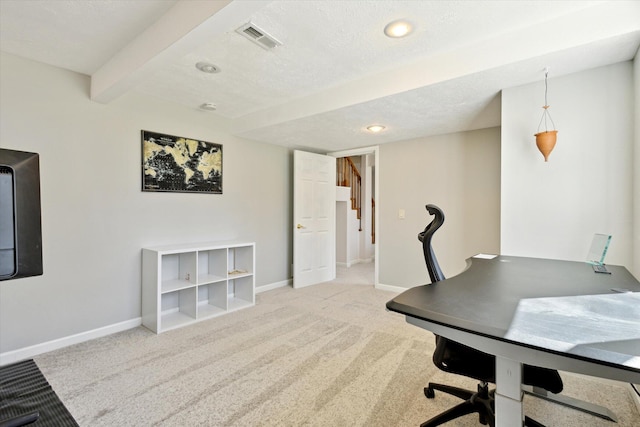 7101 River Glen Dr, Caledonia, MI 49316 - carpeted office space featuring a textured ceiling, baseboards, and visible vents
