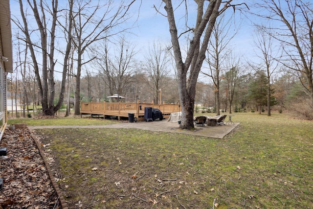 7101 River Glen Dr, Caledonia, MI 49316 - view of yard featuring a deck and a fire pit