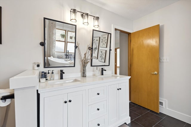 7101 River Glen Dr, Caledonia, MI 49316 - full bathroom featuring tile patterned floors, double vanity, a sink, and visible vents