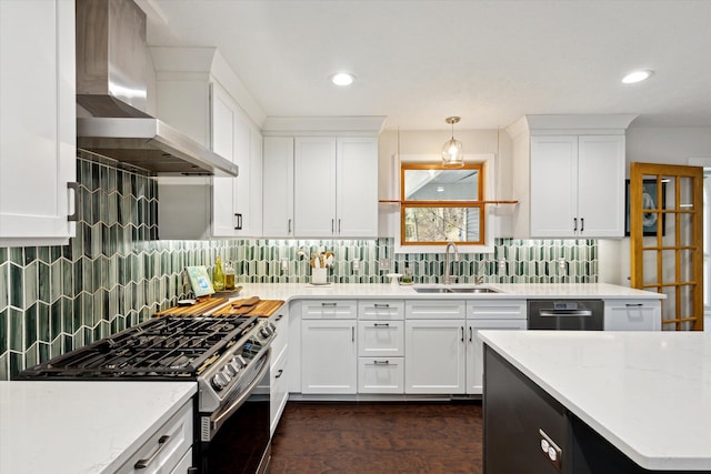7101 River Glen Dr, Caledonia, MI 49316 - kitchen with a sink, wall chimney range hood, backsplash, and gas stove