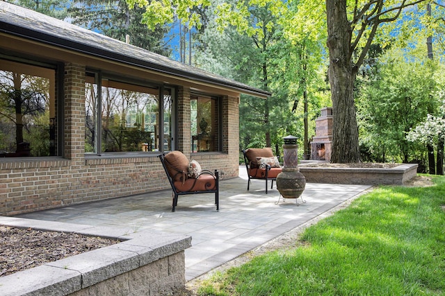 2891 Gale Rd, Ann Arbor, MI 48105 - view of patio with an outdoor fireplace