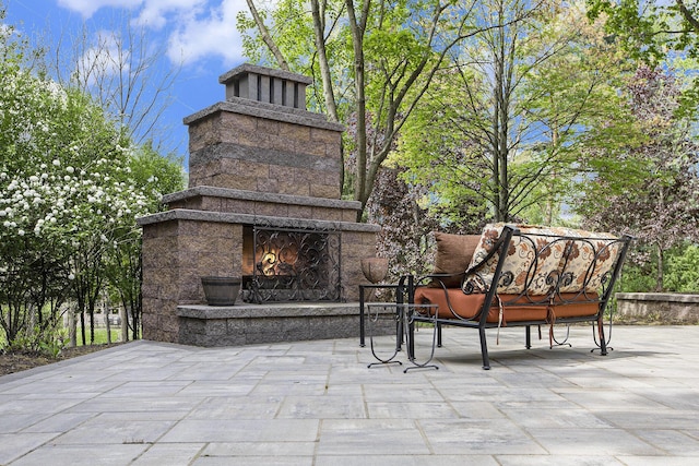 2891 Gale Rd, Ann Arbor, MI 48105 - view of patio / terrace featuring an outdoor stone fireplace