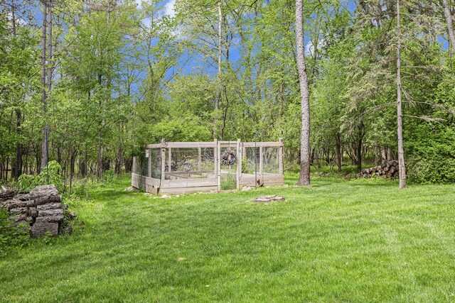2891 Gale Rd, Ann Arbor, MI 48105 - view of grassy yard with a vegetable garden