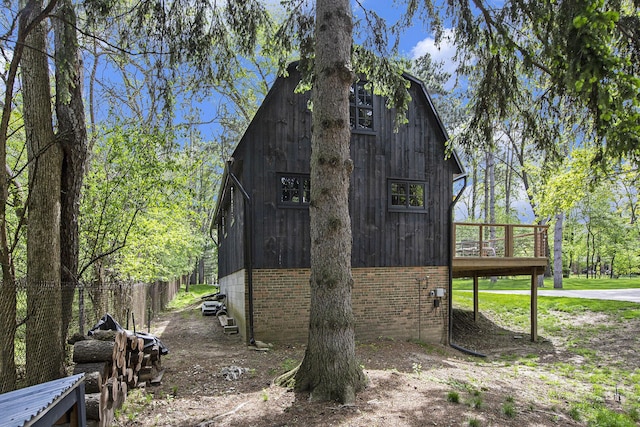 2891 Gale Rd, Ann Arbor, MI 48105 - view of side of property with brick siding and a wooden deck
