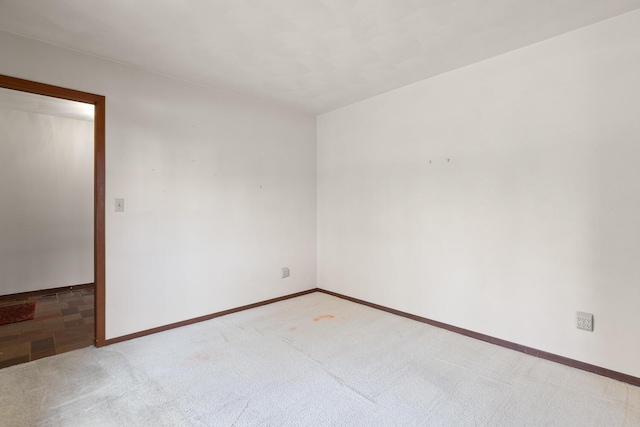 4675 Treat Hwy, Adrian, MI 49221 - spare room featuring carpet flooring and baseboards