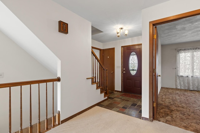 4675 Treat Hwy, Adrian, MI 49221 - foyer with carpet, healthy amount of natural light, baseboards, and a chandelier