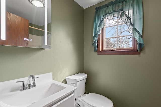 4675 Treat Hwy, Adrian, MI 49221 - bathroom featuring toilet, vanity, and a shower