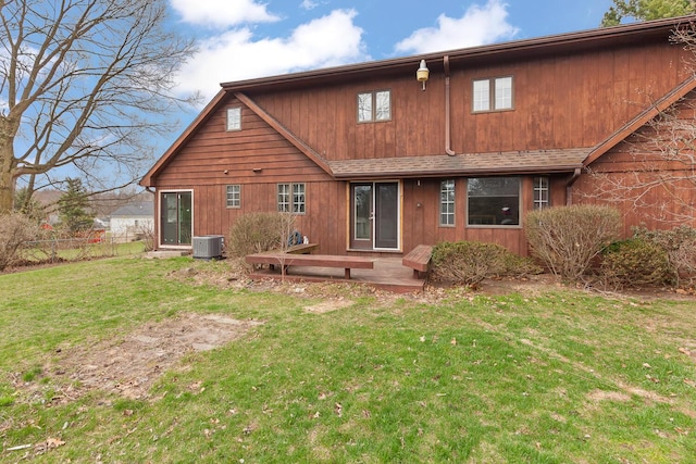 4675 Treat Hwy, Adrian, MI 49221 - rear view of house with central AC and a shingled roof