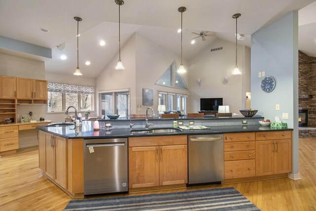 5002 Quincy Ct, Saline, MI 48176 - kitchen featuring dishwasher, a sink, high vaulted ceiling, light wood finished floors, and recessed lighting