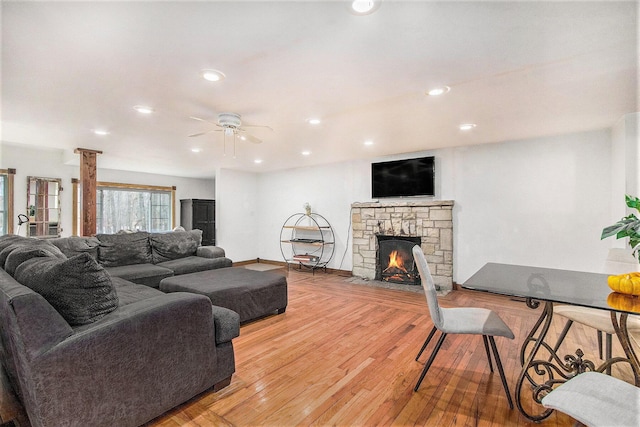 5353 Plum St, Coloma, MI 49038 - living area featuring ceiling fan, recessed lighting, a fireplace, and light wood-style flooring