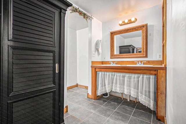 5353 Plum St, Coloma, MI 49038 - bathroom featuring tile patterned floors and vanity