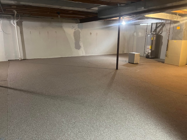 7355 Sherwood Crk, West Bloomfield, MI 48322 - unfinished basement featuring water heater and heating unit