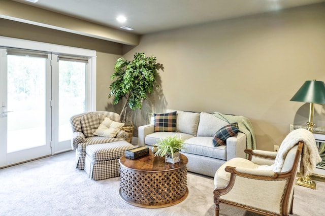 carpeted living room featuring recessed lighting