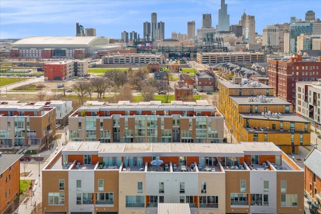 birds eye view of property featuring a city view
