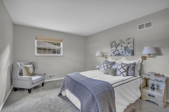 bedroom with visible vents, baseboards, and carpet floors