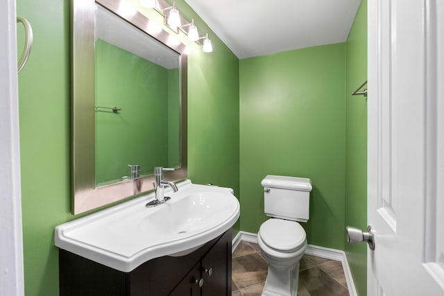 1985 Peerce, Canton, MI 48187 - bathroom featuring tile patterned flooring, vanity, baseboards, and toilet