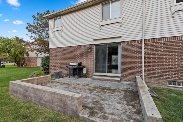 1985 Peerce, Canton, MI 48187 - back of house featuring brick siding, a patio, and a yard