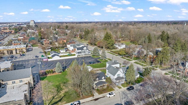 bird's eye view featuring a residential view and a view of trees