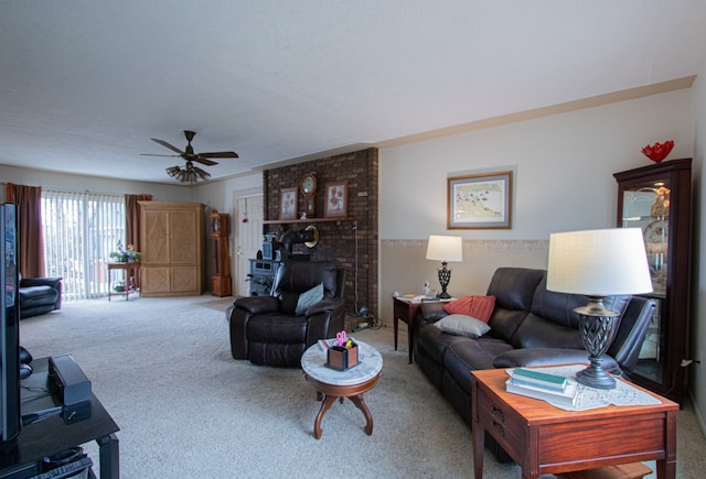 living area featuring carpet floors and a ceiling fan