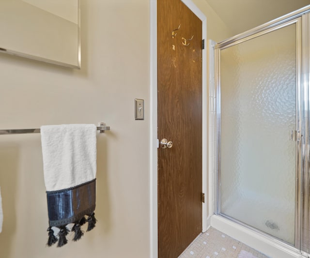 bathroom featuring a stall shower