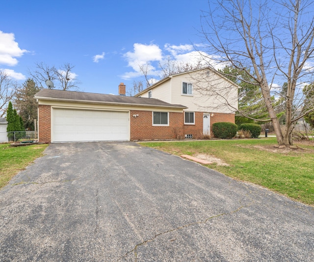 traditional-style house featuring aphalt driveway, a front yard, brick siding, a chimney, and a garage