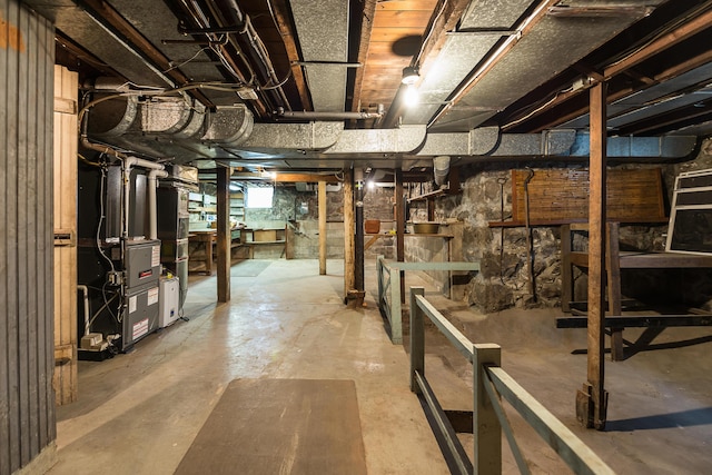basement featuring heating unit