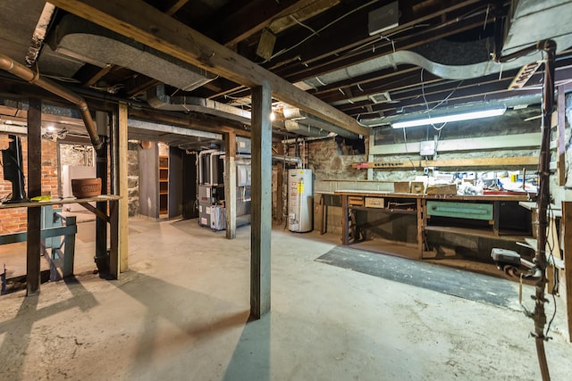 unfinished below grade area with water heater, a workshop area, and heating unit