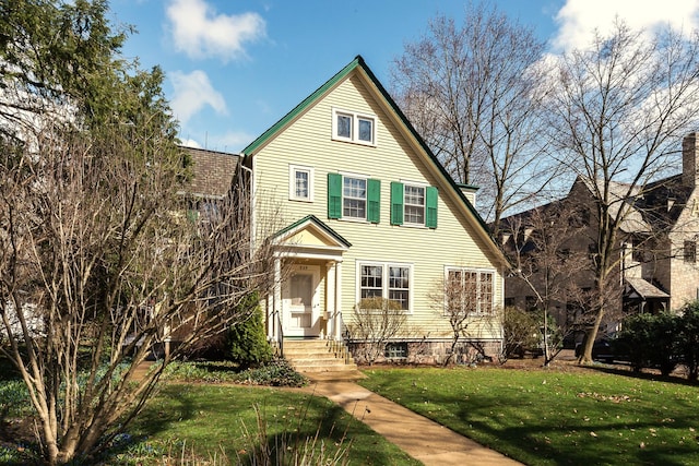 view of front of property with a front lawn