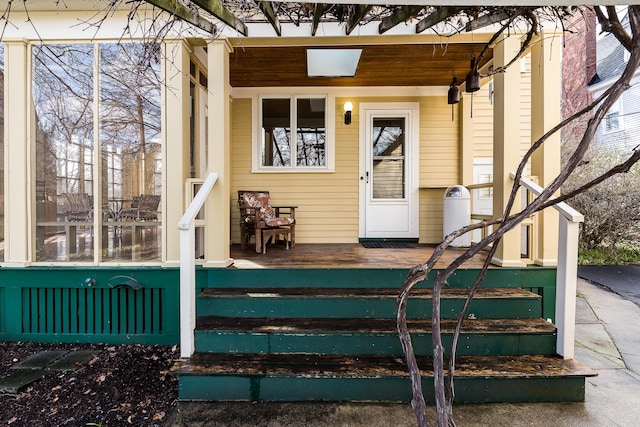 doorway to property with a porch