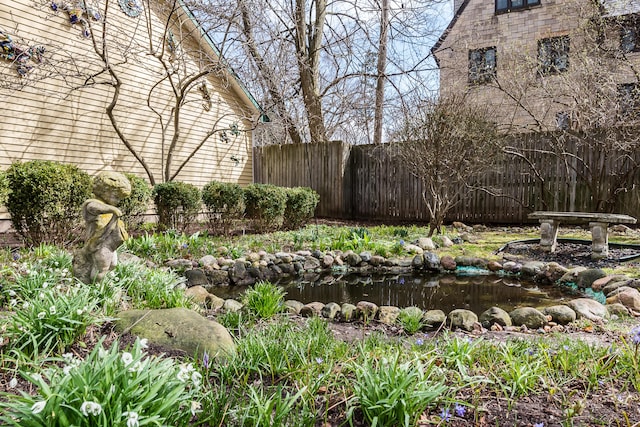 view of yard featuring fence