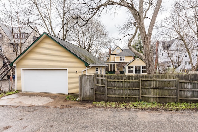 detached garage with fence