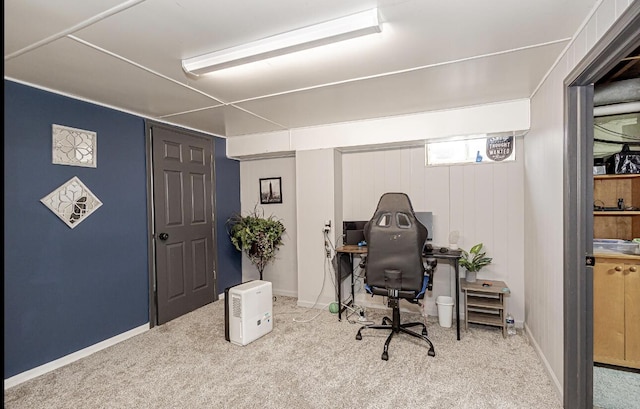carpeted home office with baseboards