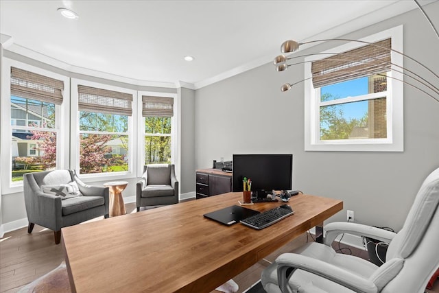 office area with a healthy amount of sunlight, baseboards, recessed lighting, and wood finished floors