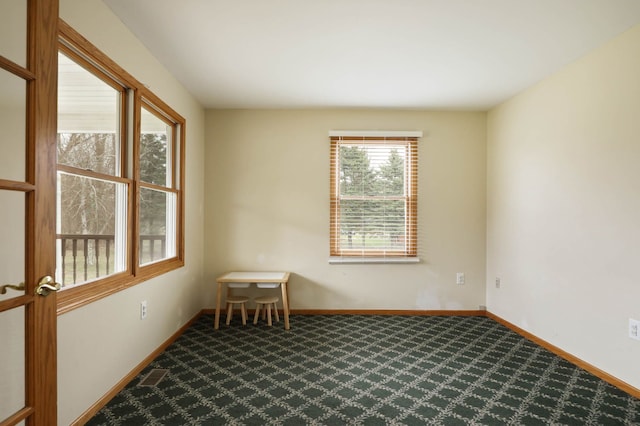 3353 Murphy Lake Rd, Millington, MI 48746 - carpeted spare room featuring baseboards and visible vents