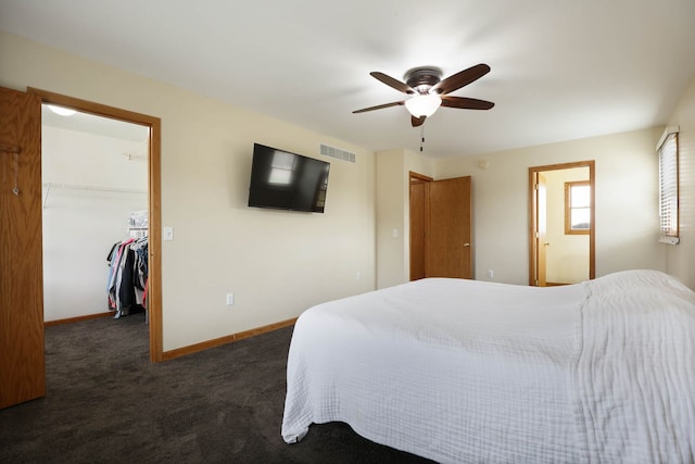 3353 Murphy Lake Rd, Millington, MI 48746 - bedroom featuring a closet, baseboards, a spacious closet, carpet floors, and visible vents