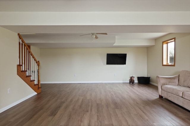3353 Murphy Lake Rd, Millington, MI 48746 - living room featuring baseboards, a ceiling fan, wood finished floors, and stairs