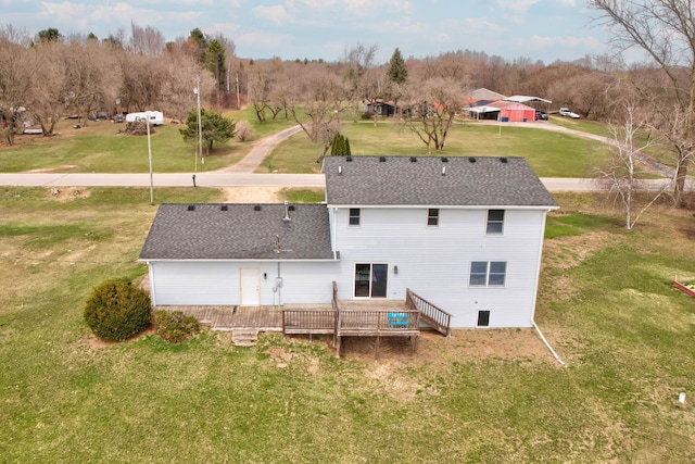 3353 Murphy Lake Rd, Millington, MI 48746 - rear view of property featuring a shingled roof, a wooden deck, and a lawn
