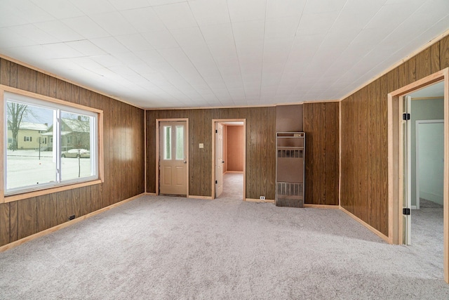 921 S Jackson St, Bay City, MI 48708 - interior space with wood walls and baseboards