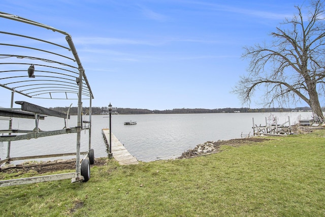 15095 N Barton Lake Dr, Vicksburg, MI 49097 - view of dock with a yard and a water view