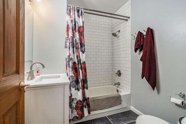 15095 N Barton Lake Dr, Vicksburg, MI 49097 - full bathroom with shower / bath combination with curtain, toilet, vanity, and baseboards