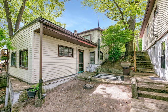 69465 High St, Union, MI 49130 - rear view of house with a patio and stairs