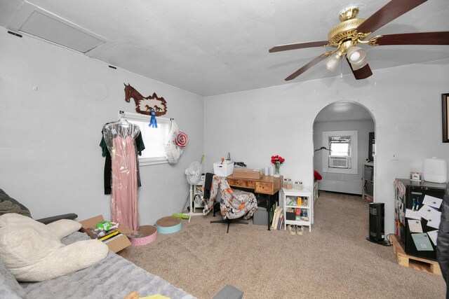 69465 High St, Union, MI 49130 - living room featuring carpet, a ceiling fan, arched walkways, and cooling unit