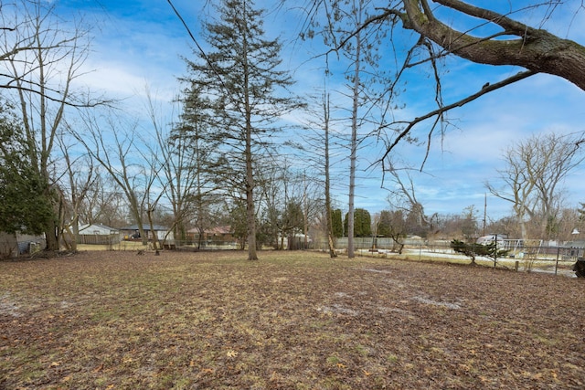 view of yard with fence