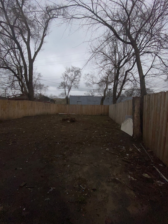 view of yard featuring a fenced backyard