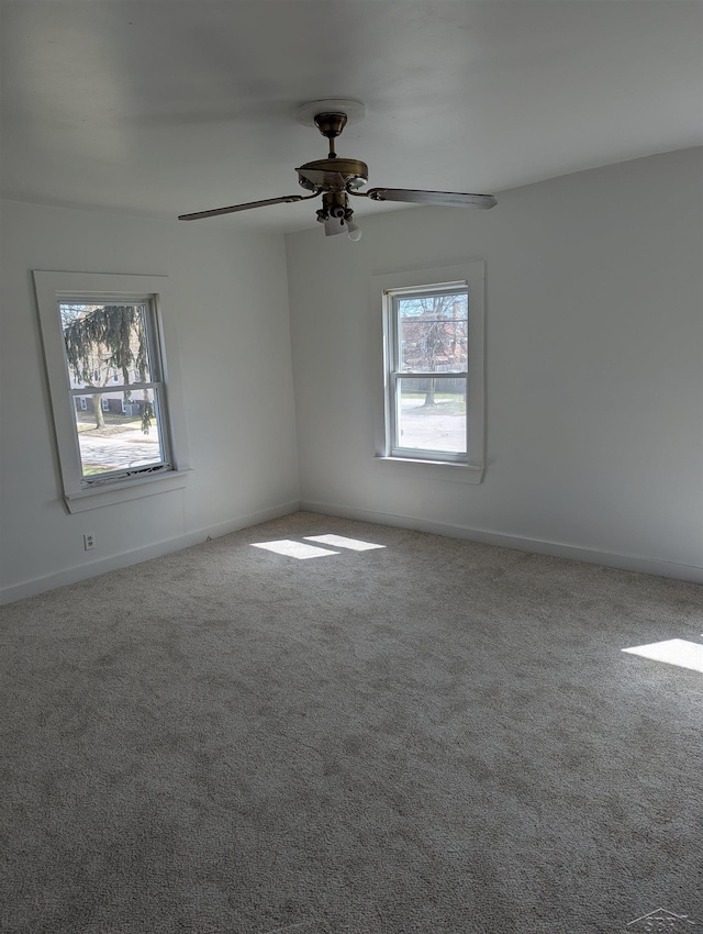 921 S Fayette St, Saginaw, MI 48602 - unfurnished room with ceiling fan, baseboards, and carpet floors