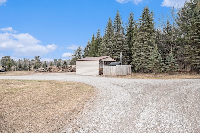garage with fence