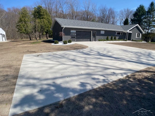 view of front of house featuring driveway and an attached garage