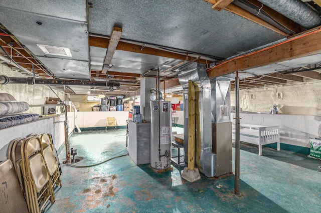 below grade area featuring water heater and heating unit