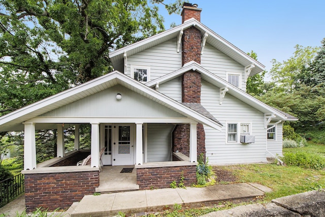165 Honey Ln, Battle Creek, MI 49015 - view of front of home featuring a chimney and a porch