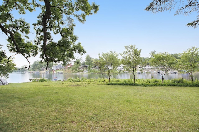 165 Honey Ln, Battle Creek, MI 49015 - view of grassy yard featuring a water view